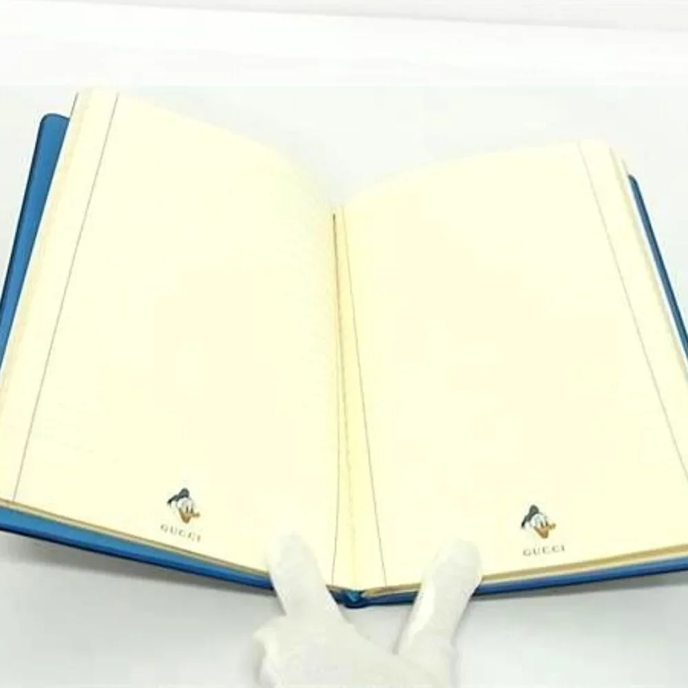 Gucci Disney Collaboration Donald Duck GG Supreme Notebook Brown Fm3097